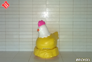 Курица-наседка с желтым гнездом желтая