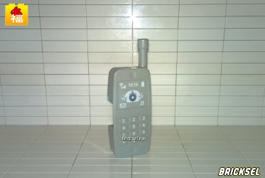 Мобильный телефон серый